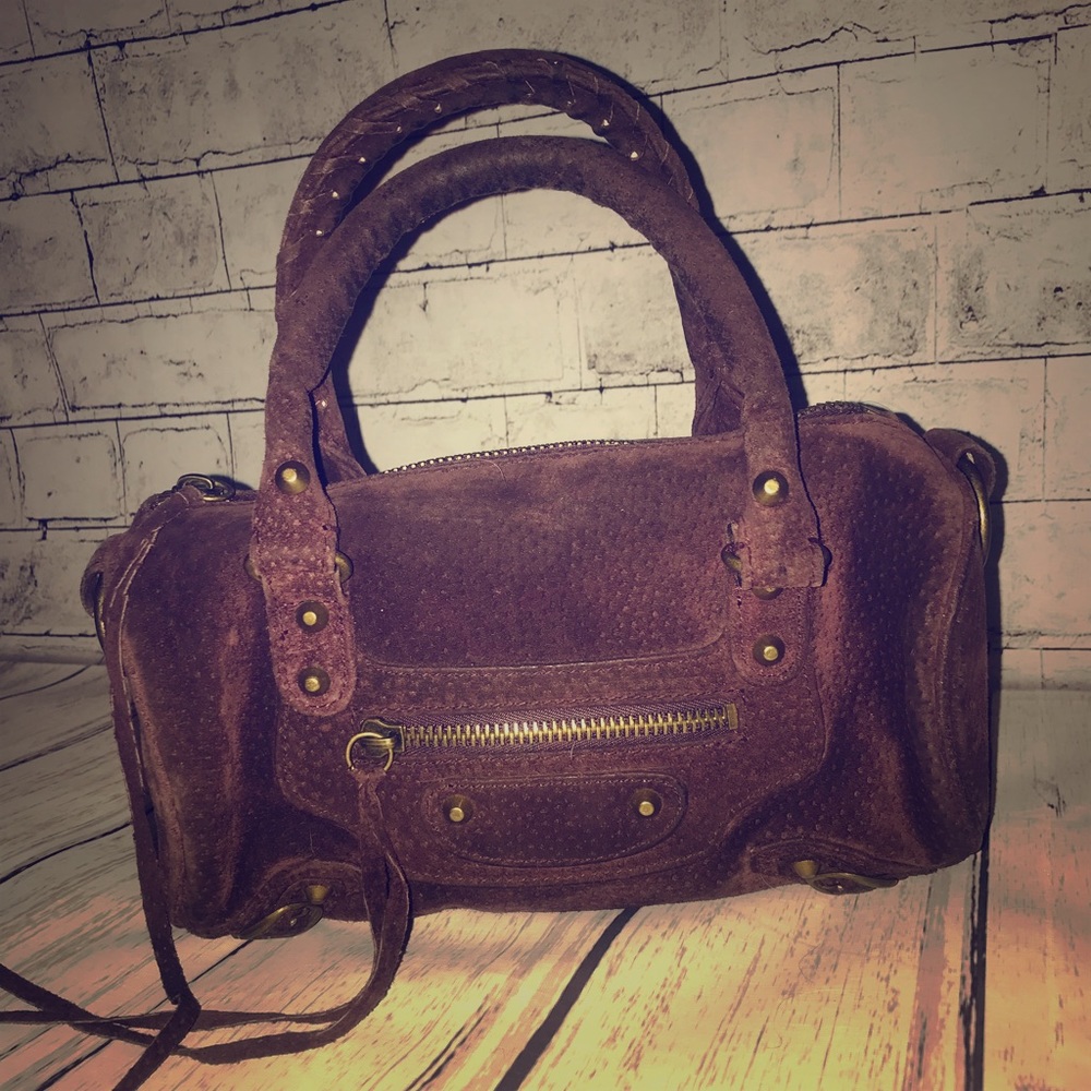 Wilson’s leather purple bag